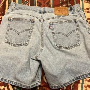 Hemmed mid thigh length vintage Levi’s. Size 12. Rigid- no stretch.